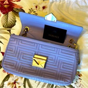 Gianni Versace. Made in Italy. Couture. 100% authentic. Original owner. Purple.